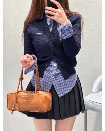  Miumiu 캐시미어 꽈배기 가디건