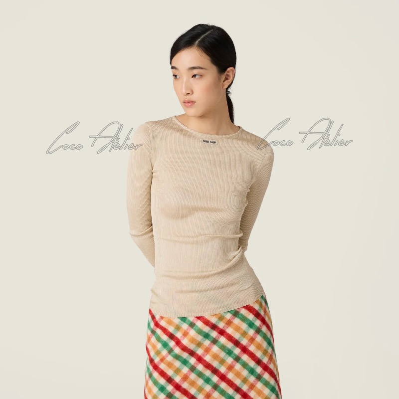 beige ribbed knitwear
